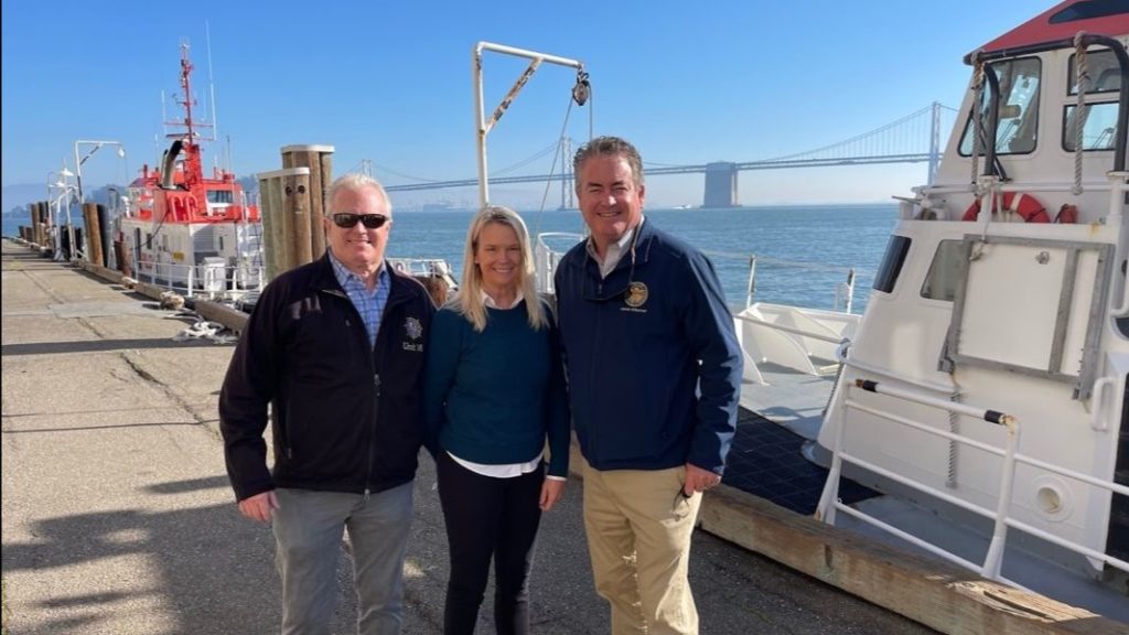 Photo of President Capt. John Carlier, Business Director Capt. Anne McIntyre, and Assemblymember Patrick O’Donnell